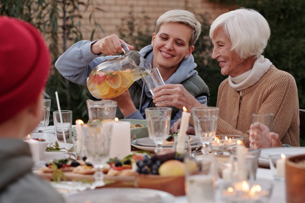 cheerful family having party in backyard